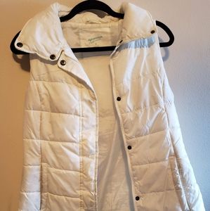 White arizona and jean vest